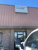 S.M. Lawrence Company logo